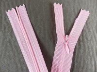 Seam-covered zippers 25 cm pink