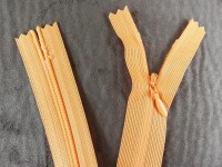 Seam-covered zippers 25 cm orange