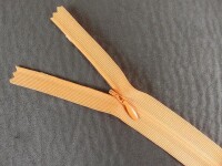 Seam-covered zippers 25 cm orange