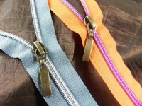 Endless zippers model "Brilliant" No. 7 / with pink spiral / cream-pink