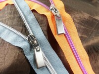 Endless zippers model "Brilliant" No. 7 / with pink spiral / orange-pink