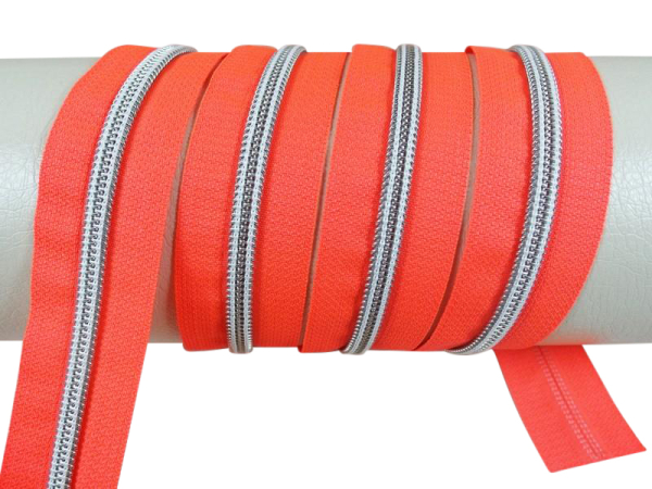 Endless zippers model "Brilliant" No. 7 / with silver spiral / neon orange-silver