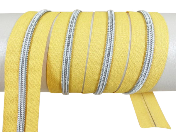 Endless zippers model "Brilliant" No. 7 / with silver spiral / rapeseed yellow-silver
