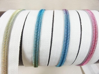 Endless zippers model "Brilliant" No. 7 / with rainbow spiral / cream