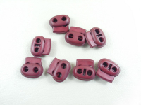 Cord stopper 2-hole - oval-tilted - for cords up to 4 mm...