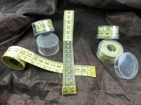 Tailors tape measure double-sided 150 cm / yellow-black...