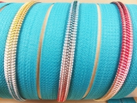 Endless zippers model "Brilliant" No. 7 / with rainbow spiral / turquoise