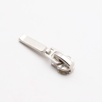 Bag zipper / jacket zipper model “TAN-Ergo”...