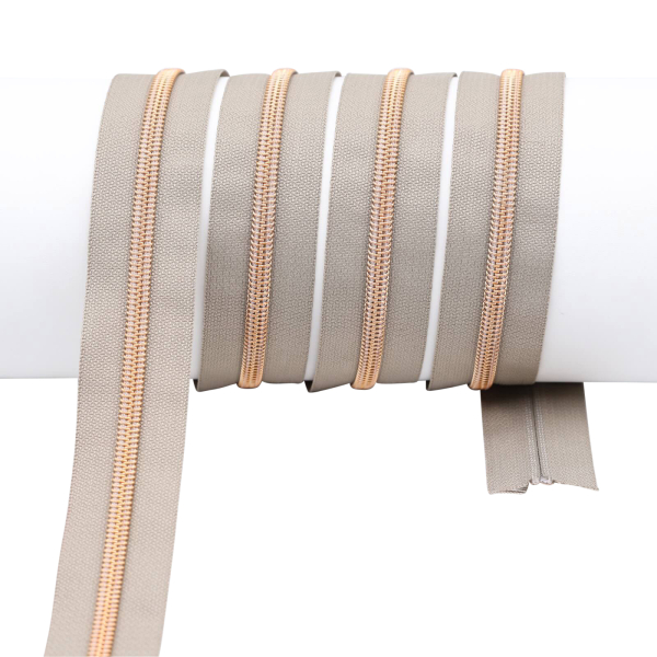 Endlos- Reißverschlüsse Modell "Brilliant" Nr. 7  mit roségoldener Spirale beige