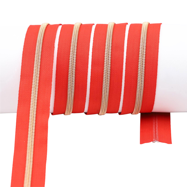 Endlos- Reißverschlüsse Modell "Brilliant" Nr. 7  mit roségoldener Spirale rot