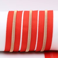 Endlos- Reißverschlüsse Modell "Brilliant" Nr. 7  mit roségoldener Spirale rot