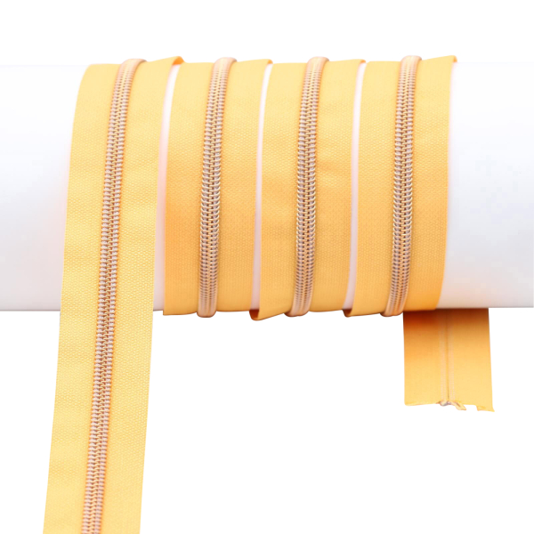 Endlos- Reißverschlüsse Modell "Brilliant" Nr. 7  mit roségoldener Spirale jeansgelb