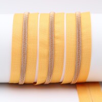 Endlos- Reißverschlüsse Modell "Brilliant" Nr. 7  mit roségoldener Spirale jeansgelb