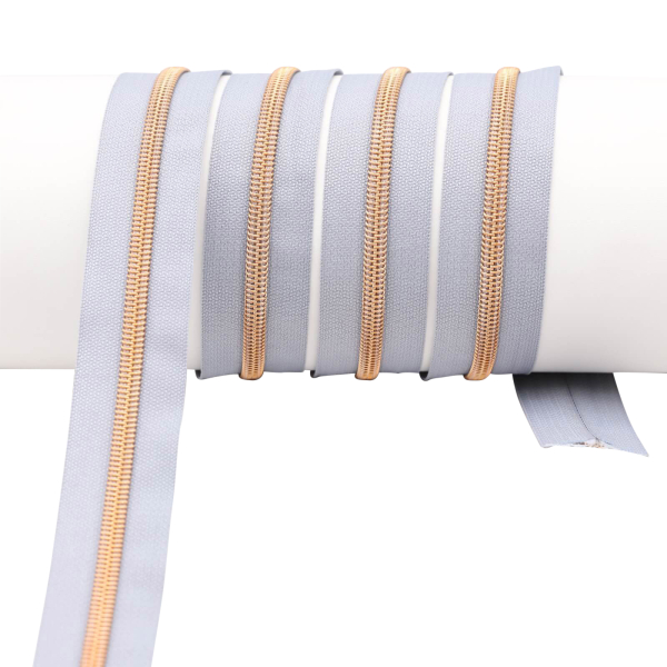 Endlos- Reißverschlüsse Modell "Brilliant" Nr. 7  mit roségoldener Spirale hellgrau