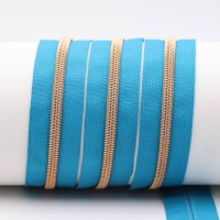 Endless zippers model "Brilliant" No. 7 with rose gold spiral turquoise