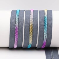 Endless zippers model "Brilliant" No. 7 / with metallized rainbow spiral dark gray-rainbow